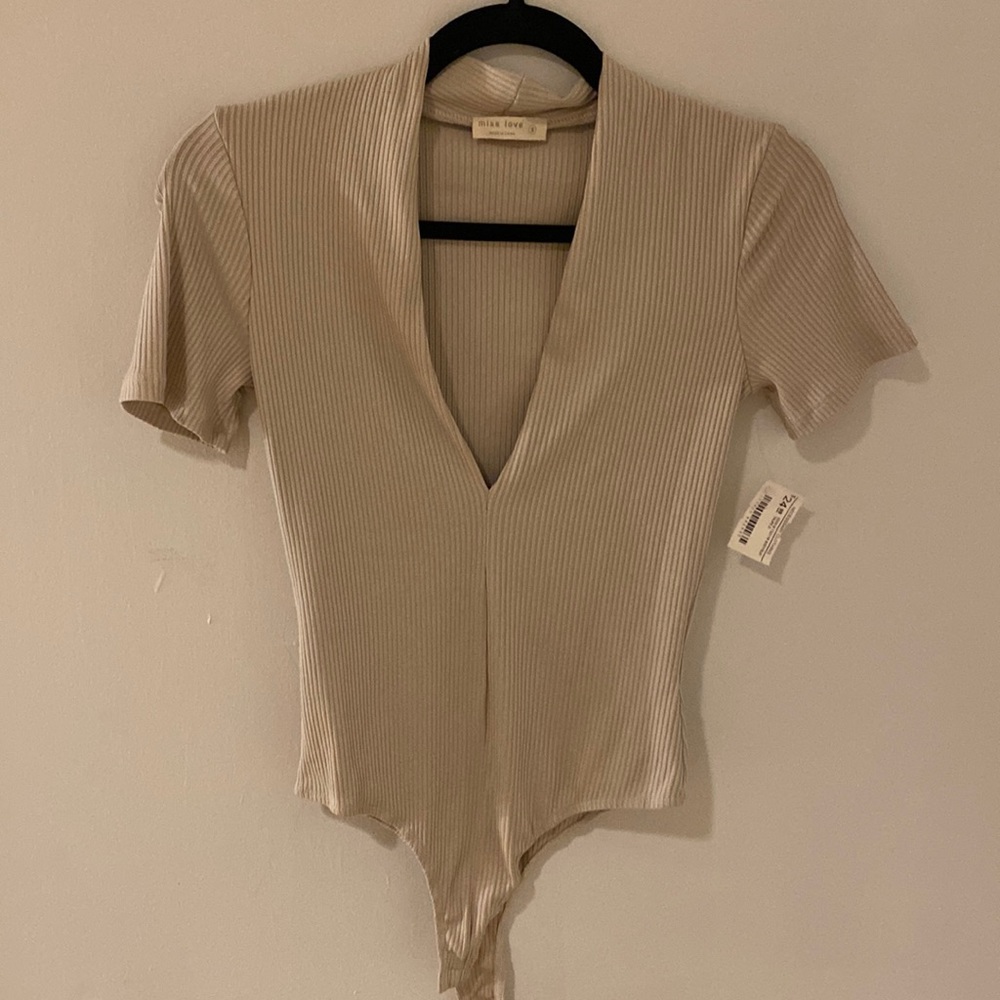 Plunge bodysuit in nude size S NWT